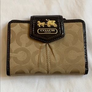 Coach wallet with logo snap and zipper pocket